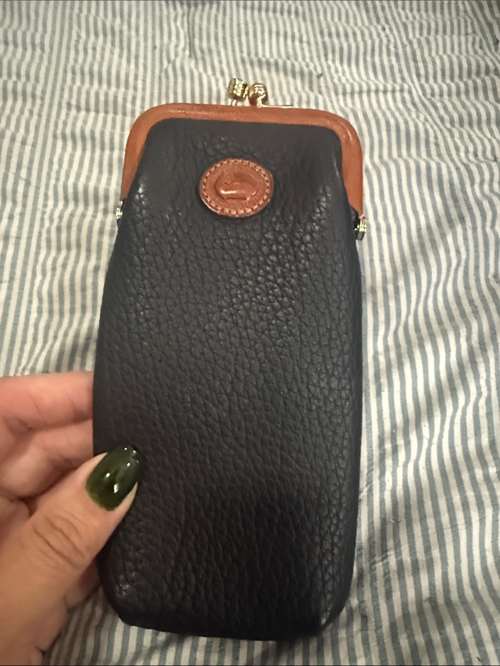 Dooney & Bourke Black with Brown Trim Leather Phone Pouch